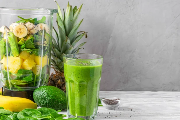 Green detox smoothie blended with fresh greens and fruit